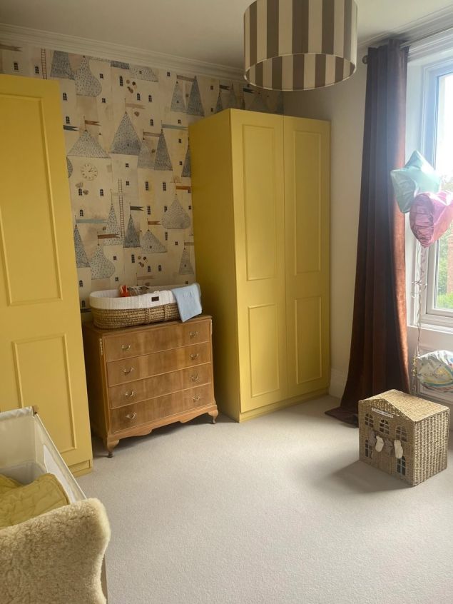 baby's nursery with mustard yellow wardrobes and cream rib loop pile carpet from Tapi